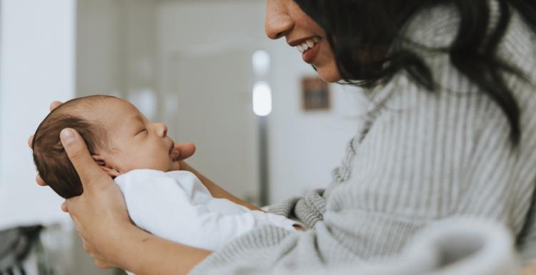 woman holding baby