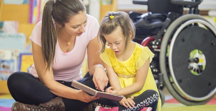 Woman looking after girl