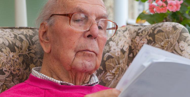 man reading newspaper